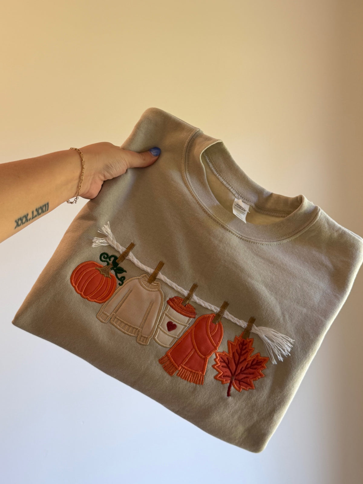 Fall embroidered sweatshirt detail